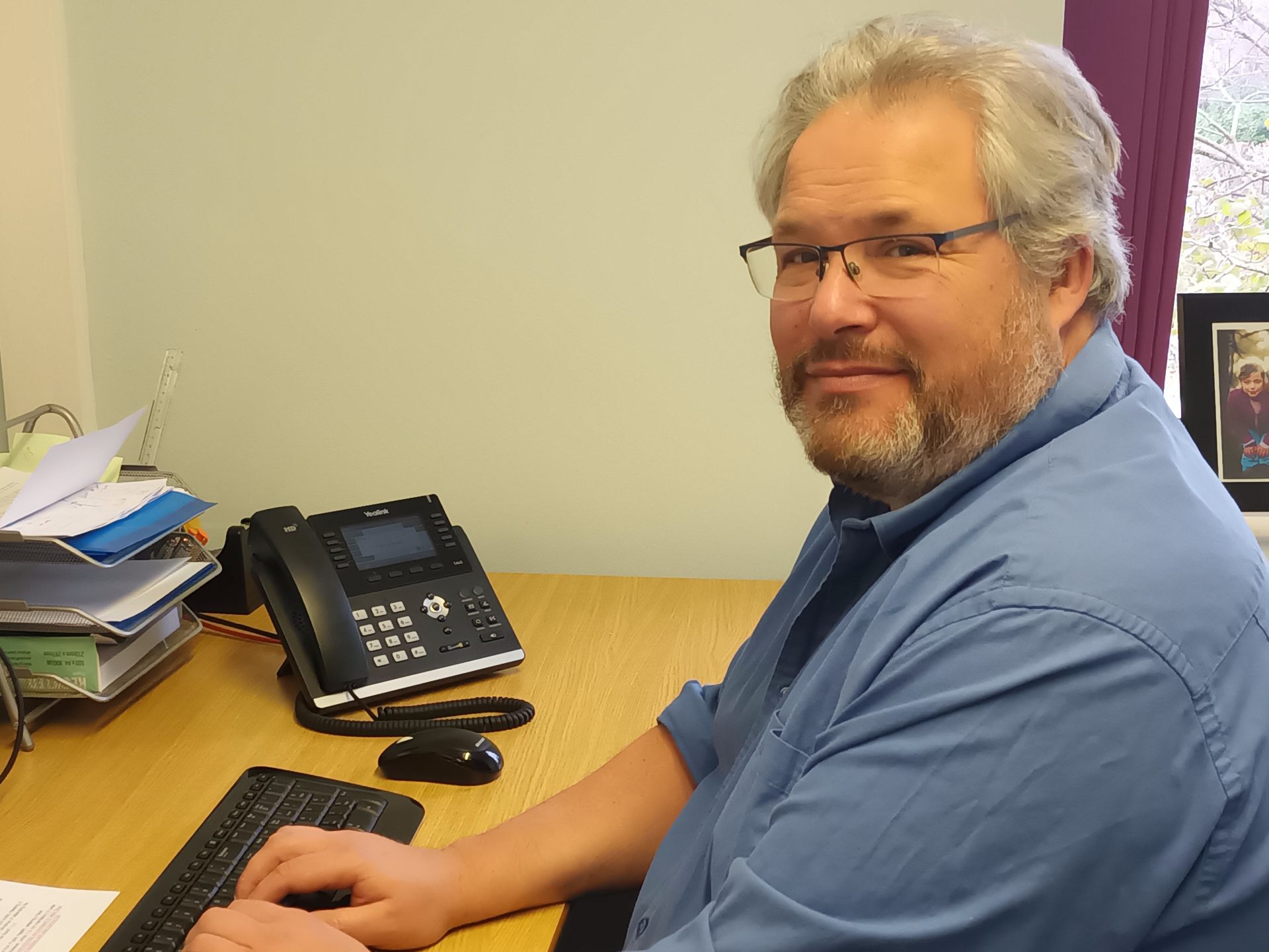 Jason Gaskell at desk.