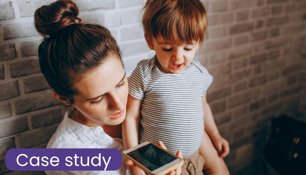 Case study (image of mother on the phone while holding a young boy)